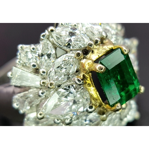 1771 - A W.G.I Certified 18K White Gold, Emerald and Diamond Dress Ring. Central Colombian 1.4ct octagonal ... 