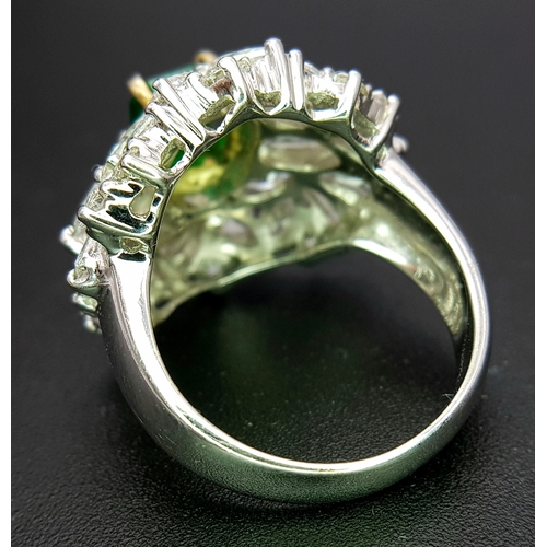 1771 - A W.G.I Certified 18K White Gold, Emerald and Diamond Dress Ring. Central Colombian 1.4ct octagonal ... 