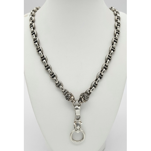 1068 - A STERLING SILVER, PANTHERS HEAD, ANCHOR LINK NECKLACE, WITH SADDLE T BAR CLASP. 22 INCHES LONG, TOT... 