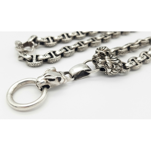 1068 - A STERLING SILVER, PANTHERS HEAD, ANCHOR LINK NECKLACE, WITH SADDLE T BAR CLASP. 22 INCHES LONG, TOT... 