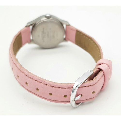 1087 - A TIMEX, WHITE DIAL, PINK STRAP WATCH. IN FULL WORKING ORDER. NEW BATTERY FITTED RECENTLY. S/A 1503 ... 