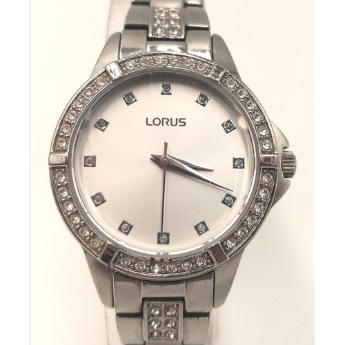 1094 - A LORUS, STONE SET, WHITE DIAL, STEEL BRACELET WATCH. IN FULL WORKING ORDER. S/A 1268 - 1
