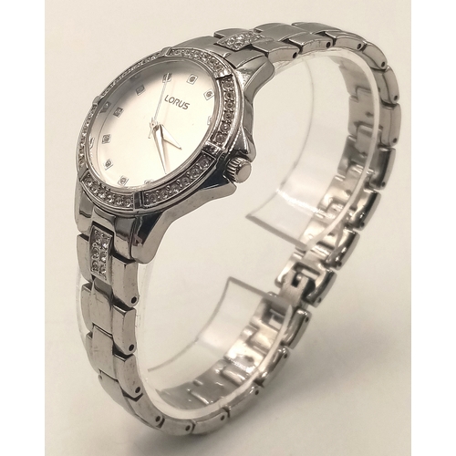 1094 - A LORUS, STONE SET, WHITE DIAL, STEEL BRACELET WATCH. IN FULL WORKING ORDER. S/A 1268 - 1