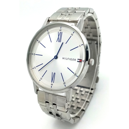 1101 - A TOMMY HILFIGER, STEEL BRACELET WATCH. IN FULL WORKING ORDER. NEW BATTERY FITTED RECENTLY. S/A 1456... 
