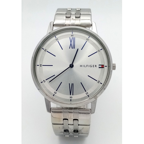1101 - A TOMMY HILFIGER, STEEL BRACELET WATCH. IN FULL WORKING ORDER. NEW BATTERY FITTED RECENTLY. S/A 1456... 