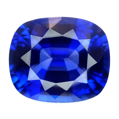 1072 - A 29.44 Ct Blue  Cushion cut Lab-Grown Sapphire. Come in a presentation case.