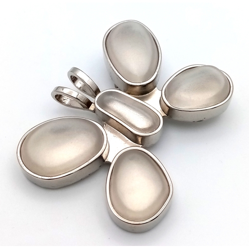 1086 - A large designer Rebecca Collins silver-tone large stone set butterfly pendant. 5 X 7 cm.