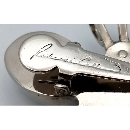 1086 - A large designer Rebecca Collins silver-tone large stone set butterfly pendant. 5 X 7 cm.