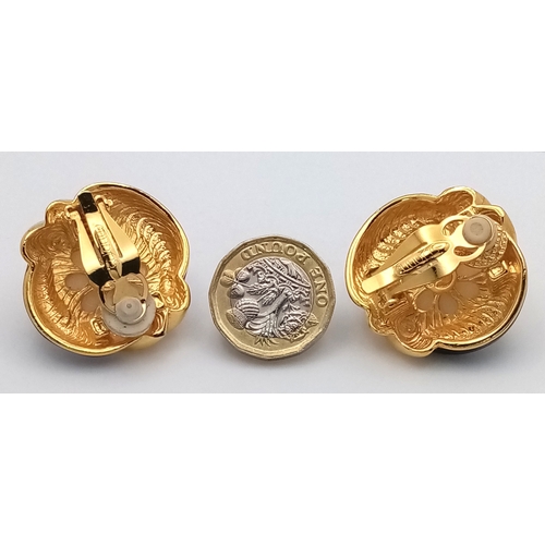 1100 - A vintage 1980s pair of designer St John gilded Faux pearl black enamelled clip earrings. New old st... 