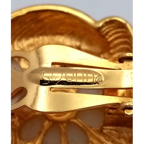 1100 - A vintage 1980s pair of designer St John gilded Faux pearl black enamelled clip earrings. New old st... 