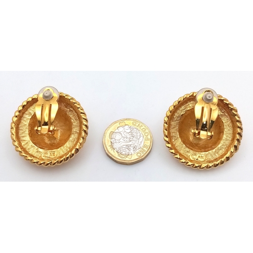 1114 - A vintage 1980s pair of gilded designer Anne Klein clip-earrings. New old stock. Diameter approx 4cm... 