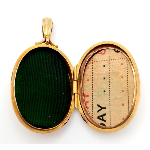 20 - A 9K GOLD VINTAGE LOCKET PENDANT WITH BEAUTIFUL HAND CHASED DECORATION ON BOTH SIDES .    6.2gms    ... 