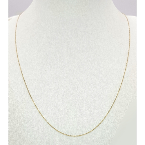 28 - Classic 9 CARAT GOLD FINE CHAIN NECKLACE. 0.45 Grams. 46 cm.