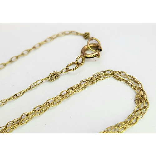 28 - Classic 9 CARAT GOLD FINE CHAIN NECKLACE. 0.45 Grams. 46 cm.