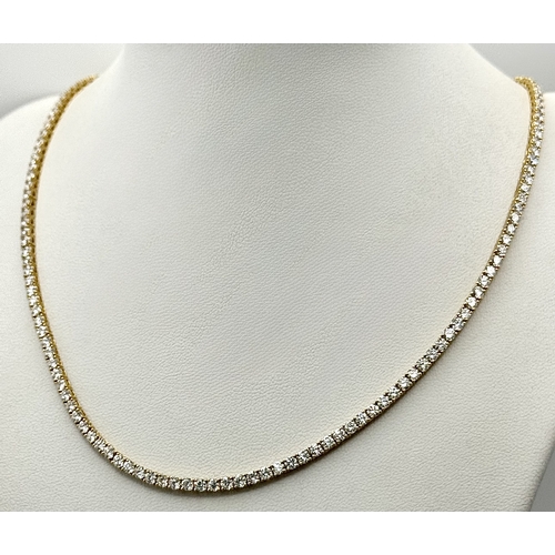 27 - A FABULOUS 10K YELLOW GOLD TENNIS NECKLACE WITH 11.17ctw OF TOP QUALITY LAB GROWN DIAMONDS. D - E IN... 
