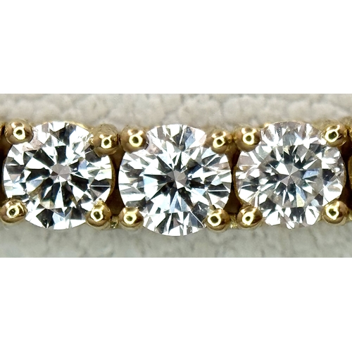 27 - A FABULOUS 10K YELLOW GOLD TENNIS NECKLACE WITH 11.17ctw OF TOP QUALITY LAB GROWN DIAMONDS. D - E IN... 