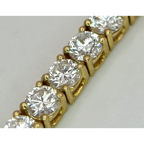 27 - A FABULOUS 10K YELLOW GOLD TENNIS NECKLACE WITH 11.17ctw OF TOP QUALITY LAB GROWN DIAMONDS. D - E IN... 