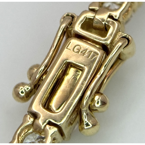 27 - A FABULOUS 10K YELLOW GOLD TENNIS NECKLACE WITH 11.17ctw OF TOP QUALITY LAB GROWN DIAMONDS. D - E IN... 