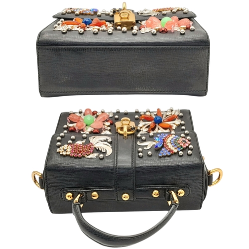 2 - A Dolce and Gabbana Dolce Fish Crystal Box Leather Bag. Textured black leather exterior with gold-to... 