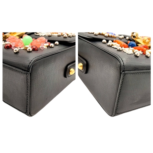 2 - A Dolce and Gabbana Dolce Fish Crystal Box Leather Bag. Textured black leather exterior with gold-to... 