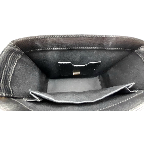 2 - A Dolce and Gabbana Dolce Fish Crystal Box Leather Bag. Textured black leather exterior with gold-to... 