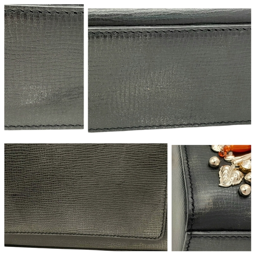 2 - A Dolce and Gabbana Dolce Fish Crystal Box Leather Bag. Textured black leather exterior with gold-to... 
