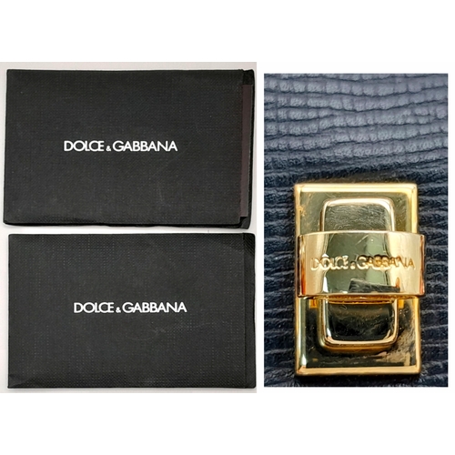 2 - A Dolce and Gabbana Dolce Fish Crystal Box Leather Bag. Textured black leather exterior with gold-to... 