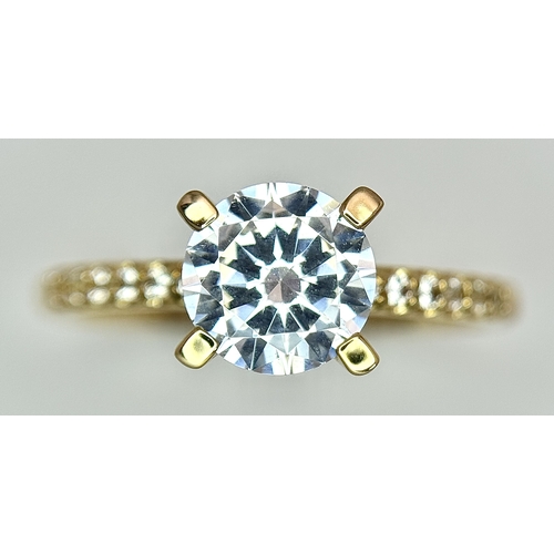 16 - A Glamira 14K Yellow Gold Swarovski Crystal Ring. Size R1/2, 3.93g total weight. Comes with box, pou... 