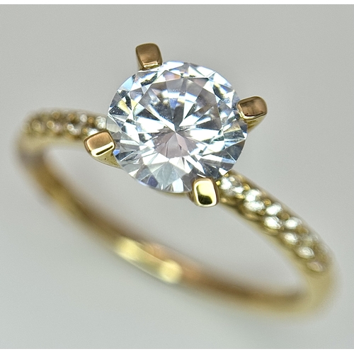 16 - A Glamira 14K Yellow Gold Swarovski Crystal Ring. Size R1/2, 3.93g total weight. Comes with box, pou... 