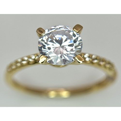 16 - A Glamira 14K Yellow Gold Swarovski Crystal Ring. Size R1/2, 3.93g total weight. Comes with box, pou... 