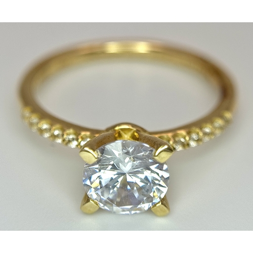 16 - A Glamira 14K Yellow Gold Swarovski Crystal Ring. Size R1/2, 3.93g total weight. Comes with box, pou... 
