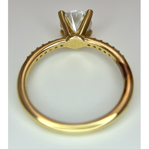 16 - A Glamira 14K Yellow Gold Swarovski Crystal Ring. Size R1/2, 3.93g total weight. Comes with box, pou... 