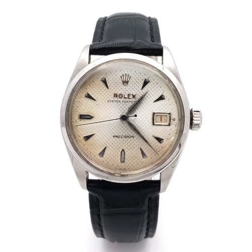 37 - A VINTAGE  ROLEX OYSTER PERPETUAL WATCH WITH RARE WAFFLE DIAL. BLACK LEATHER STRAP. STAINLESS STEEL ... 