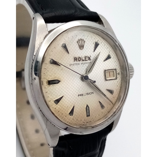 37 - A VINTAGE  ROLEX OYSTER PERPETUAL WATCH WITH RARE WAFFLE DIAL. BLACK LEATHER STRAP. STAINLESS STEEL ... 