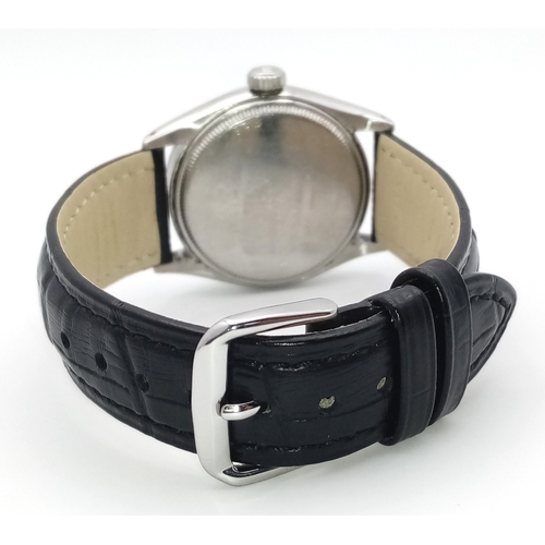 37 - A VINTAGE  ROLEX OYSTER PERPETUAL WATCH WITH RARE WAFFLE DIAL. BLACK LEATHER STRAP. STAINLESS STEEL ... 