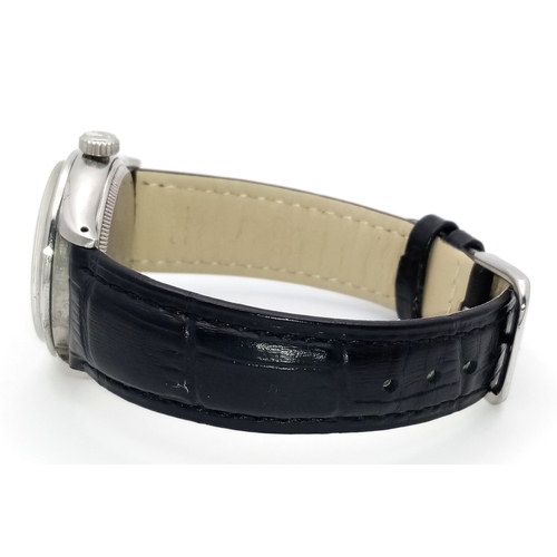 37 - A VINTAGE  ROLEX OYSTER PERPETUAL WATCH WITH RARE WAFFLE DIAL. BLACK LEATHER STRAP. STAINLESS STEEL ... 