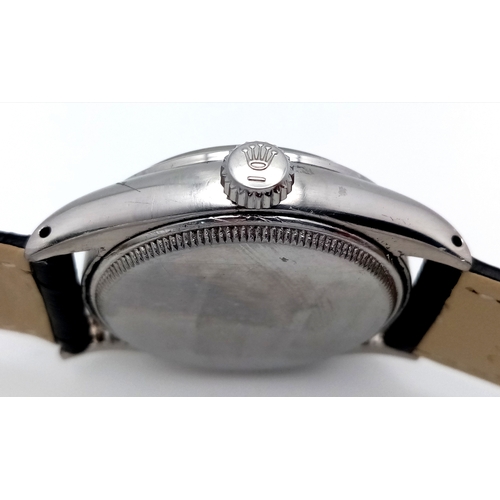 37 - A VINTAGE  ROLEX OYSTER PERPETUAL WATCH WITH RARE WAFFLE DIAL. BLACK LEATHER STRAP. STAINLESS STEEL ... 