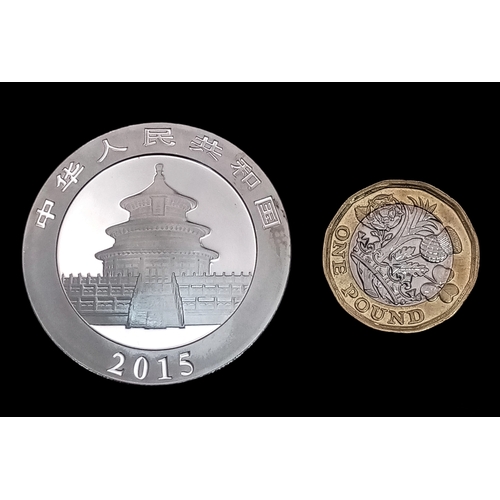 1066 - A 2015 Mint Condition Fine Silver Chinese Panda Coin. Comes in Capsule.31.13 Grams.