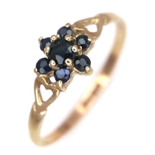 1073 - A Vintage 1984 Hallmarked 9 Carat Gold and Sapphire Cluster Ring Size P. The Ring measures 7mm Wide ... 