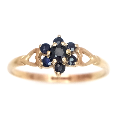 1073 - A Vintage 1984 Hallmarked 9 Carat Gold and Sapphire Cluster Ring Size P. The Ring measures 7mm Wide ... 
