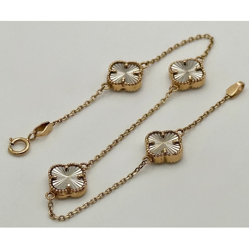 57 - AN 18K ROSE GOLD CLOVER BRACELET, WITH 18K WHITE GOLD CLOVER PARTS. TOTAL WEIGHT 5.4G. SC 1044