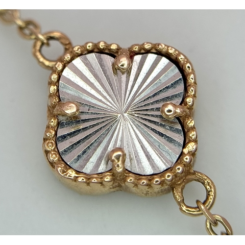 57 - AN 18K ROSE GOLD CLOVER BRACELET, WITH 18K WHITE GOLD CLOVER PARTS. TOTAL WEIGHT 5.4G. SC 1044