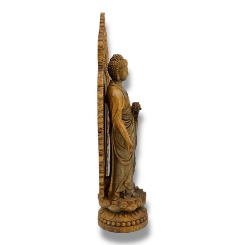 1099 - A large natural Hand-Carved Agarwood  Standing Buddha Lotus Shrine Sculpture. 
The natural agarwood ... 