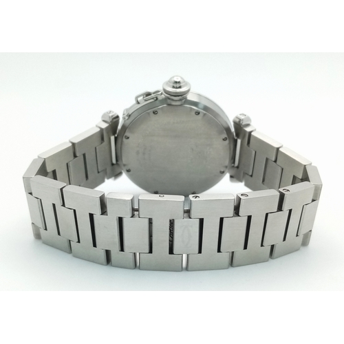 31 - A Pasha de Cartier Diamond Ladies Watch. Stainless steel bracelet and case - 36mm. Diamond encrusted... 