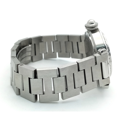31 - A Pasha de Cartier Diamond Ladies Watch. Stainless steel bracelet and case - 36mm. Diamond encrusted... 