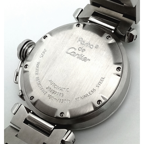 31 - A Pasha de Cartier Diamond Ladies Watch. Stainless steel bracelet and case - 36mm. Diamond encrusted... 