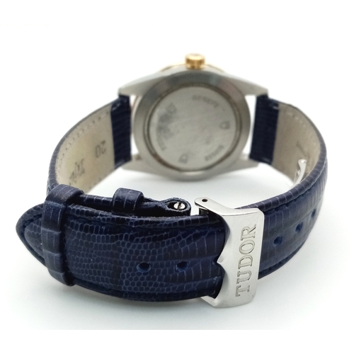 52 - A Tudor Glamour Automatic Diamond Unisex Watch. Blue leather strap. Stainless steel case - 36mm. Gol... 