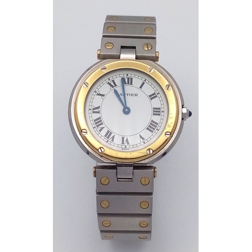 53 - A Cartier Santos Ronde Bi-Metal Ladies Quartz Watch. Stainless steel bracelet with gold accents. Sta... 