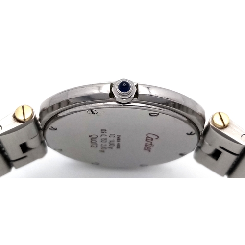 53 - A Cartier Santos Ronde Bi-Metal Ladies Quartz Watch. Stainless steel bracelet with gold accents. Sta... 