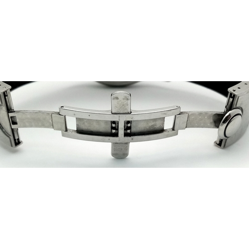 59 - A Corum Bubble, Diamond Gents Watch. Model 163.150.20. 
Black leather and rubber strap - With a Coru... 